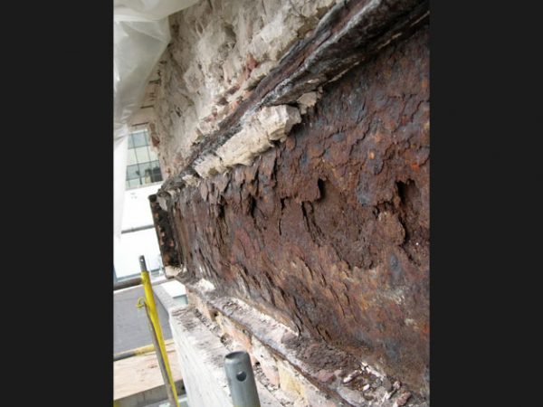 Rusting structural steel can cause major deterioration to the exterior envelope of a masonry building.