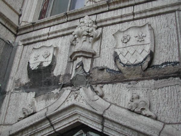 Spalled terra cotta as a result of underlying rusting steel.